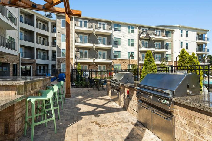 exterior patio and grilling station on sunny day