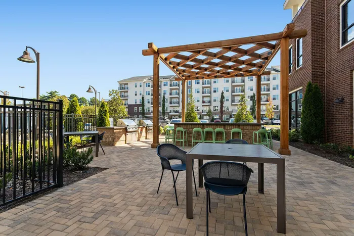 exterior patio and grilling station on sunny day