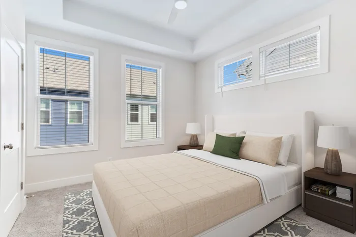 furnished bedroom with bed and window in home