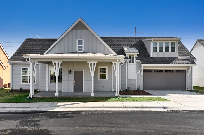 Exterior of home with garage on a sunny day