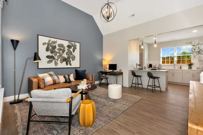 Furnished living room with couch and chairs