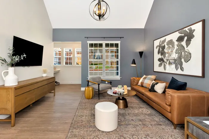 Furnished living room with couch and chairs