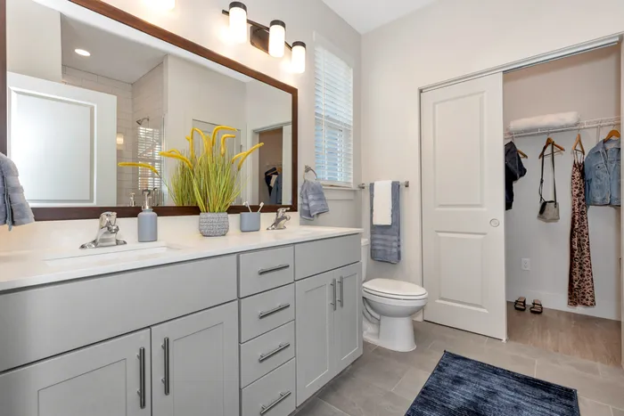 Furnished bathroom with double vanity