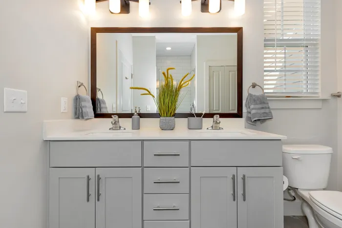 Furnished bathroom with double vanity