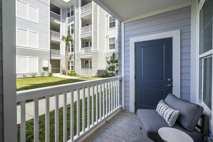 furnished patio of apartment home with seating