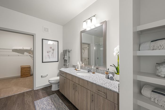 furnished bathroom with closet
