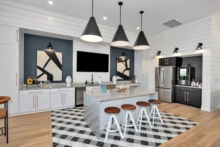 Kitchen area with tables and chairs