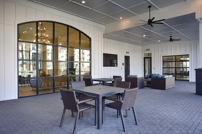 Outdoor patio with tables and chairs