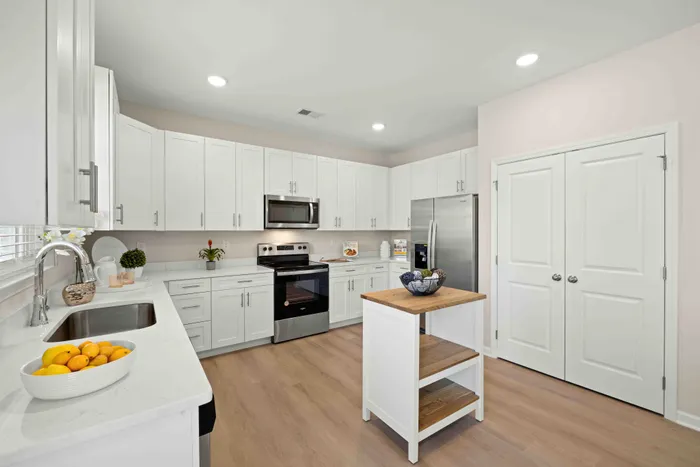 kitchen with white cabinets and stainless steel appliances