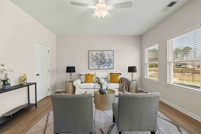 furnished living room with wood style flooring