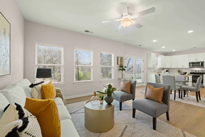 furnished living room with wood style flooring