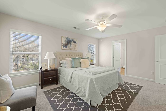 main bedroom with ceiling fan