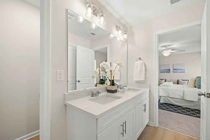 main bathroom with dual vanity