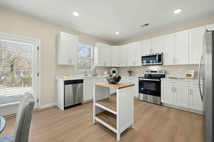 furnished kitchen with wood style flooring