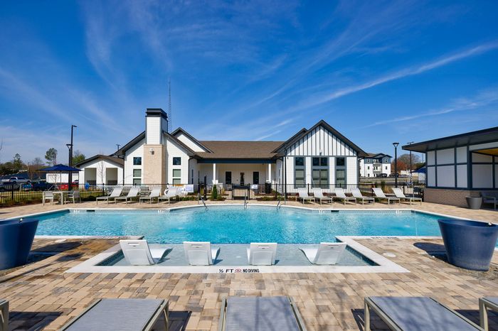 Exterior of clubhouse and pool