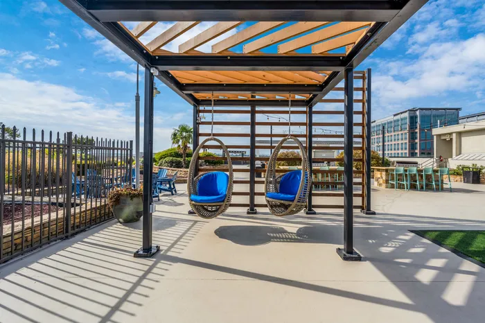 Community sitting area on pool pavilion on sunny day