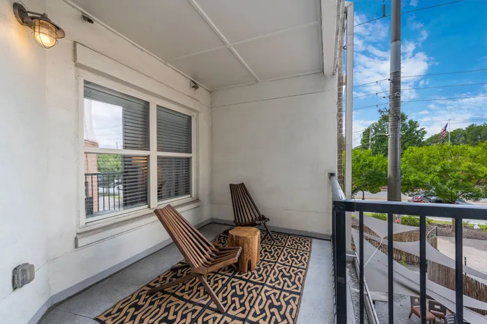 Furnished patio exterior model apartment