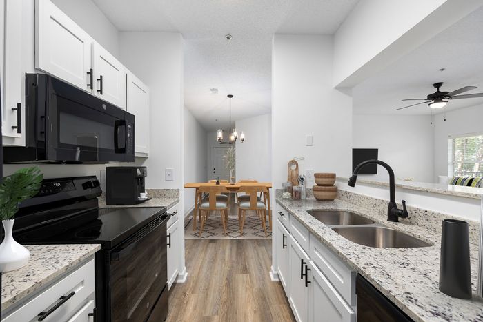 Virtually staged kitchen and dining room