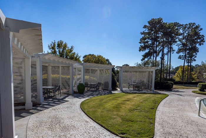Cabanas with sitting chairs and tables