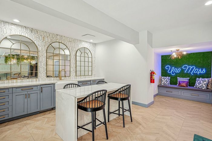 Indoor community kitchen with counter and island