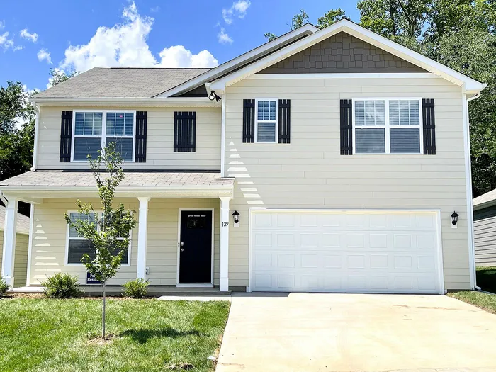 Apartments Near Asheville Outlets - Fairview Meadows - Two-Story White House w/ Black Trimming, Attached Garage, and a Driveway