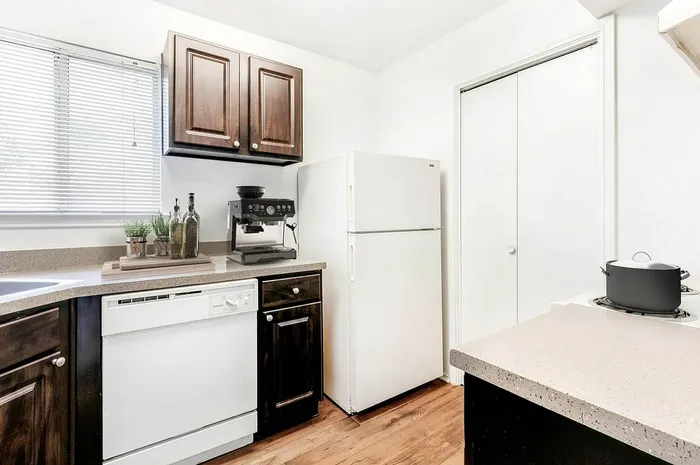 Kitchen with brown cabinetry