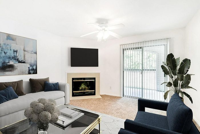 Furnished living room with fireplace
