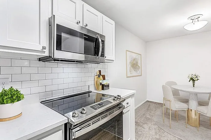 Furnished kitchen with stainless steel appliances