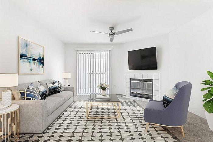Furnished living room with fireplace