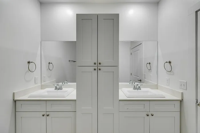 Primary bathroom with his and hers vanities at Paragon Luxury Apartments in Athens, GA