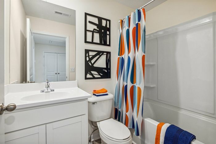 Guest bathroom with shower and tub combo