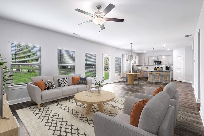 Virtually staged living room with couches and chairs