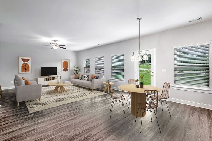 Virtually staged dining room and living room