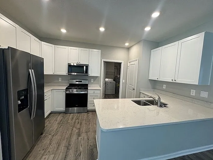 Kitchen with white cabinets