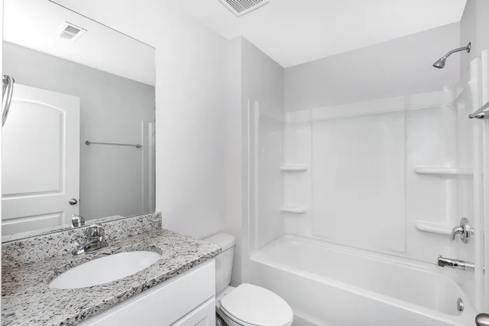 Guest bathroom with shower tub