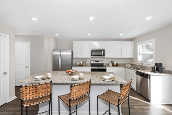 Kitchen with stainless steel appliances and island