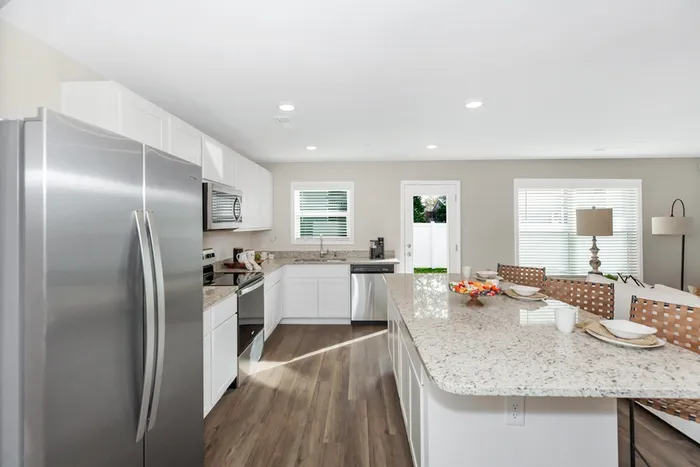 Kitchen with stainless steel appliances and island