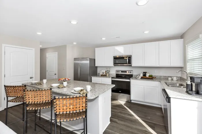 Kitchen with stainless steel appliances and island