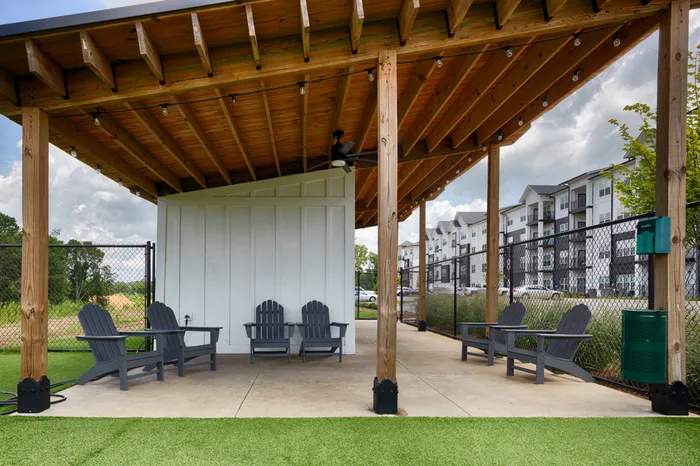 Apartments Near Huntsville - Gateway Village - Dog Park with Turf, Fenced in Area, and Lawn Chairs