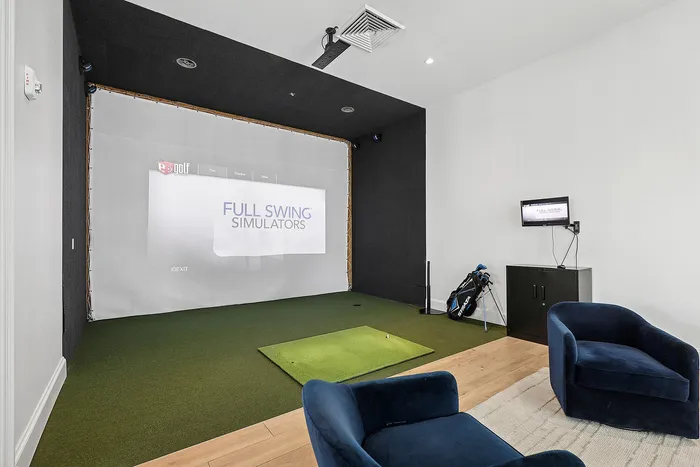 Pet-Friendly Apartments in Lantana, FL - Ivory Lantana - Golf Simulator with Large Screen.