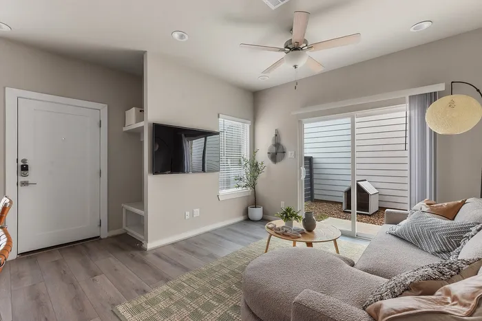 Furnished living room with TV