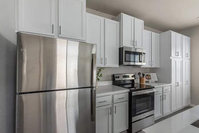Furnished kitchen with stainless steel appliances