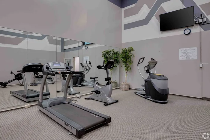 fitness center with cardio machines