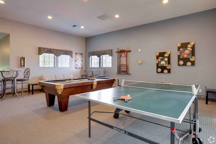 clubroom with billiards table and ping pong table