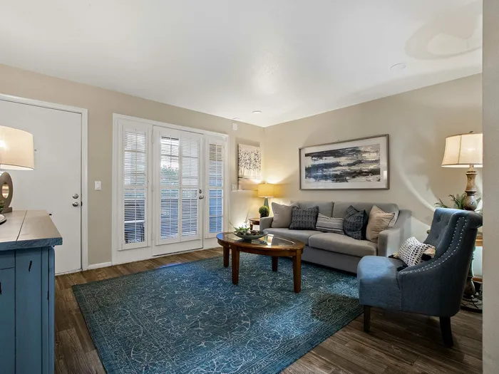 living area with wood style flooring