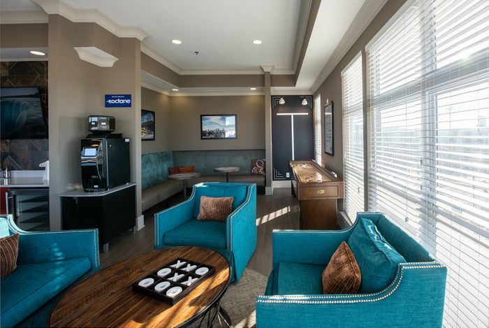 clubhouse with lounge seating and coffee machine