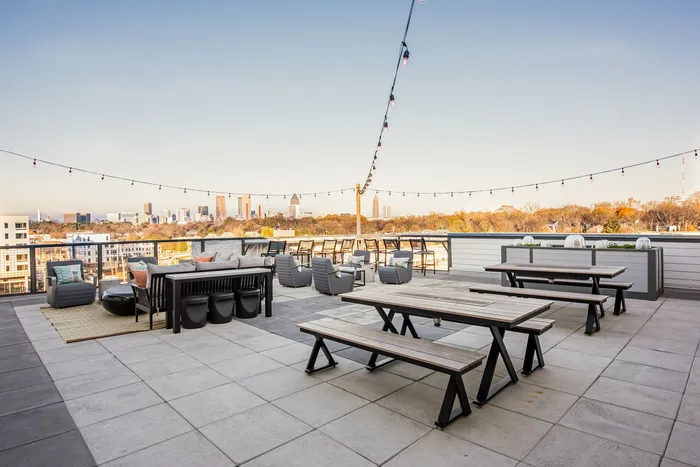 rooftop dining area with skyline view