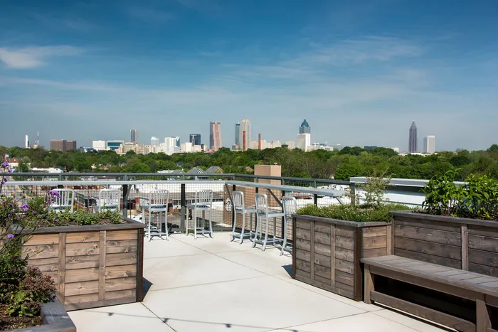 rooftop with lounge seating and skyline view