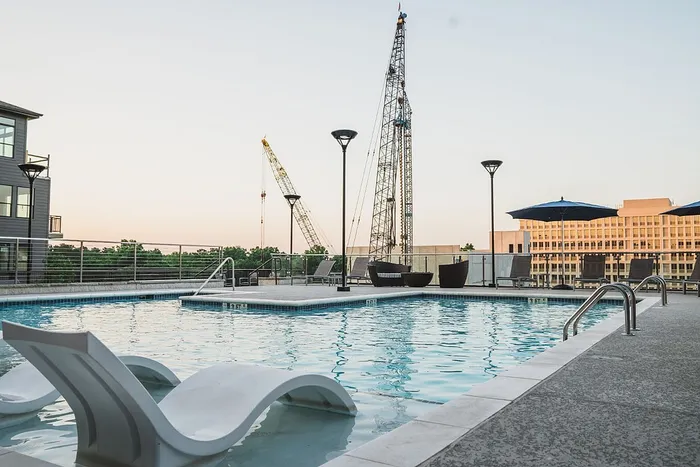 Swimming pool with lounge chairs