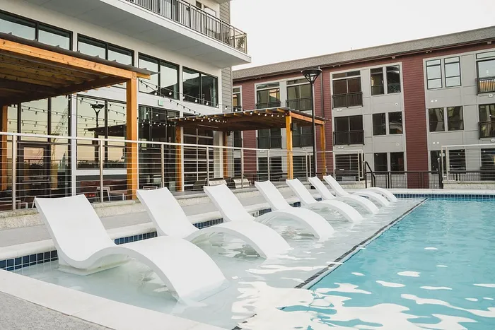 Swimming pool with lounge chairs